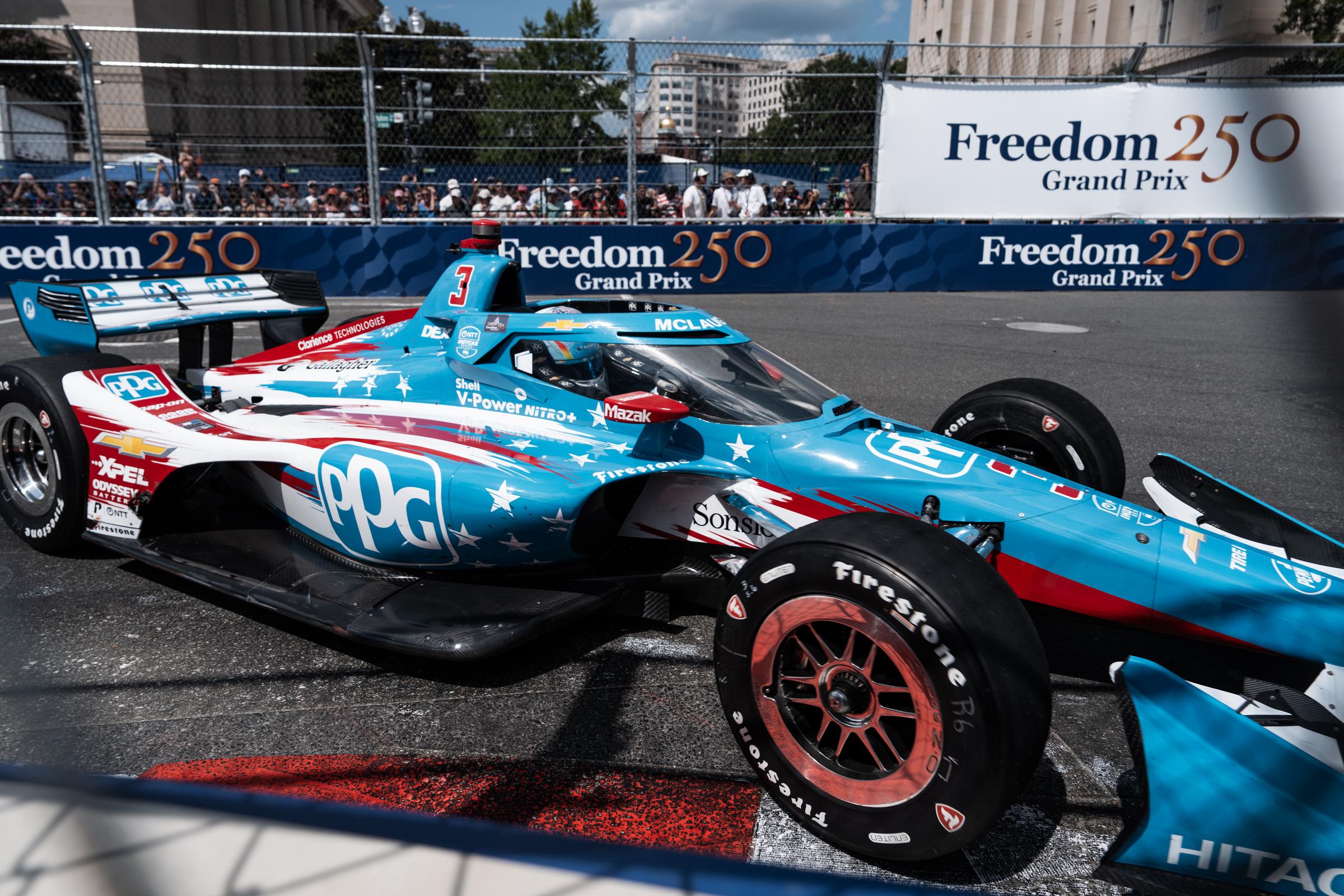 Melania Trump wore a crisp outfit. In this photo, Scott McLaughlin turned onto 7th Street in the #3 PPG Team Penske Chev