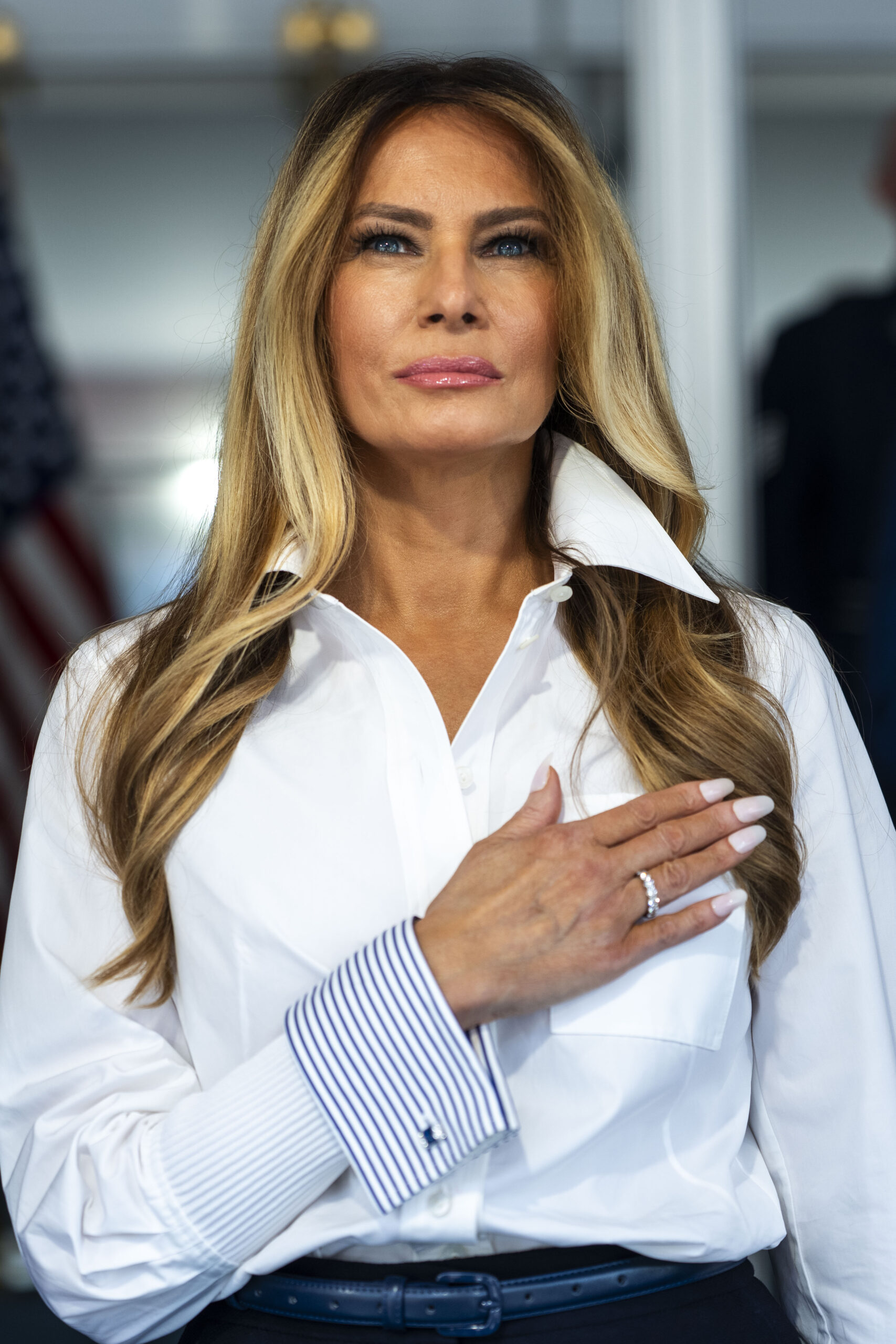 Netizens focused heavily on the first lady's manicure. In this photo, Melania Trump stood during the National Anthem at