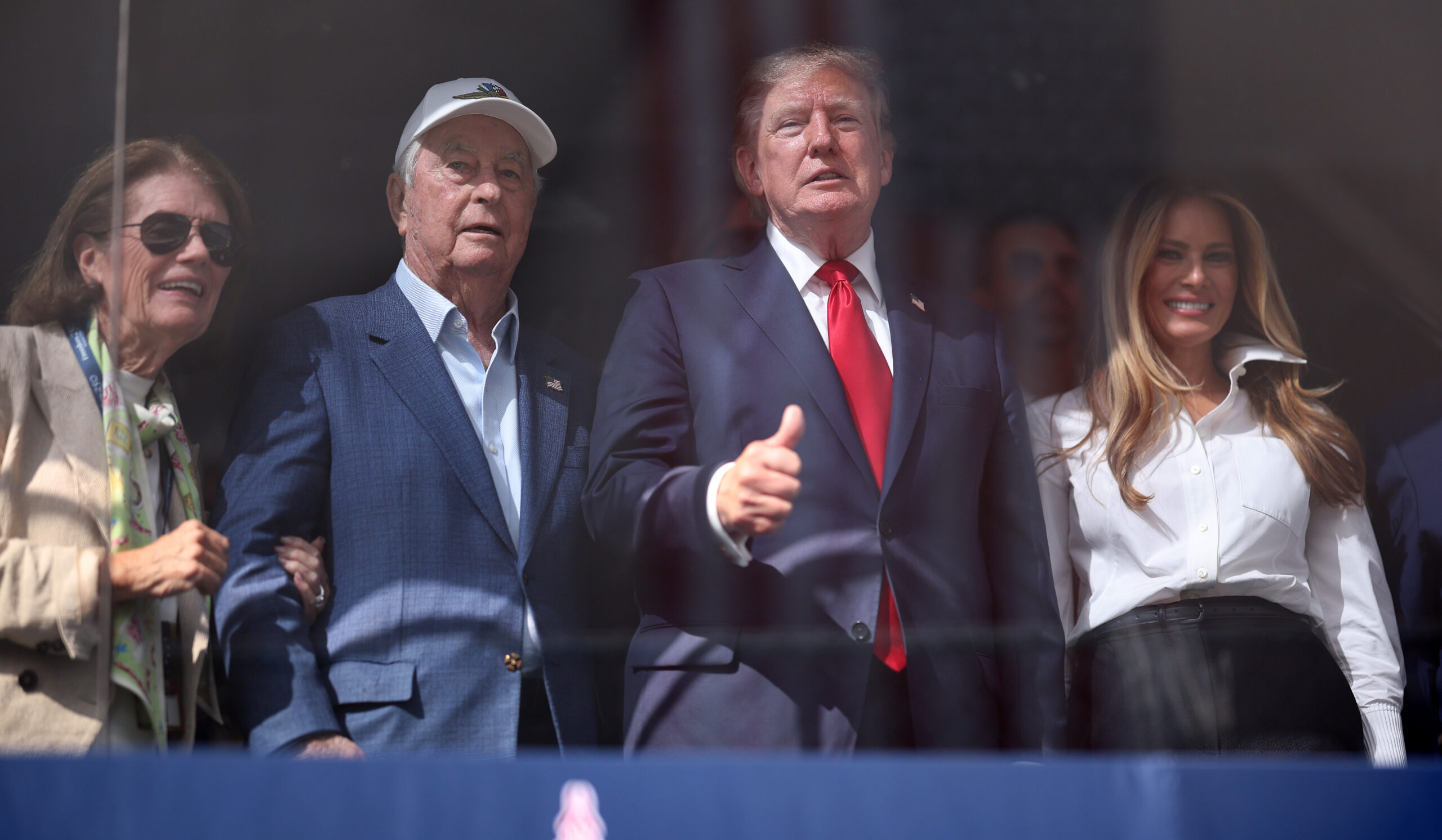 Donald Trump and Melania Trump joined Roger Penske during the NTT INDYCAR Series Freedom 250 on August 23, 2026, in Wash