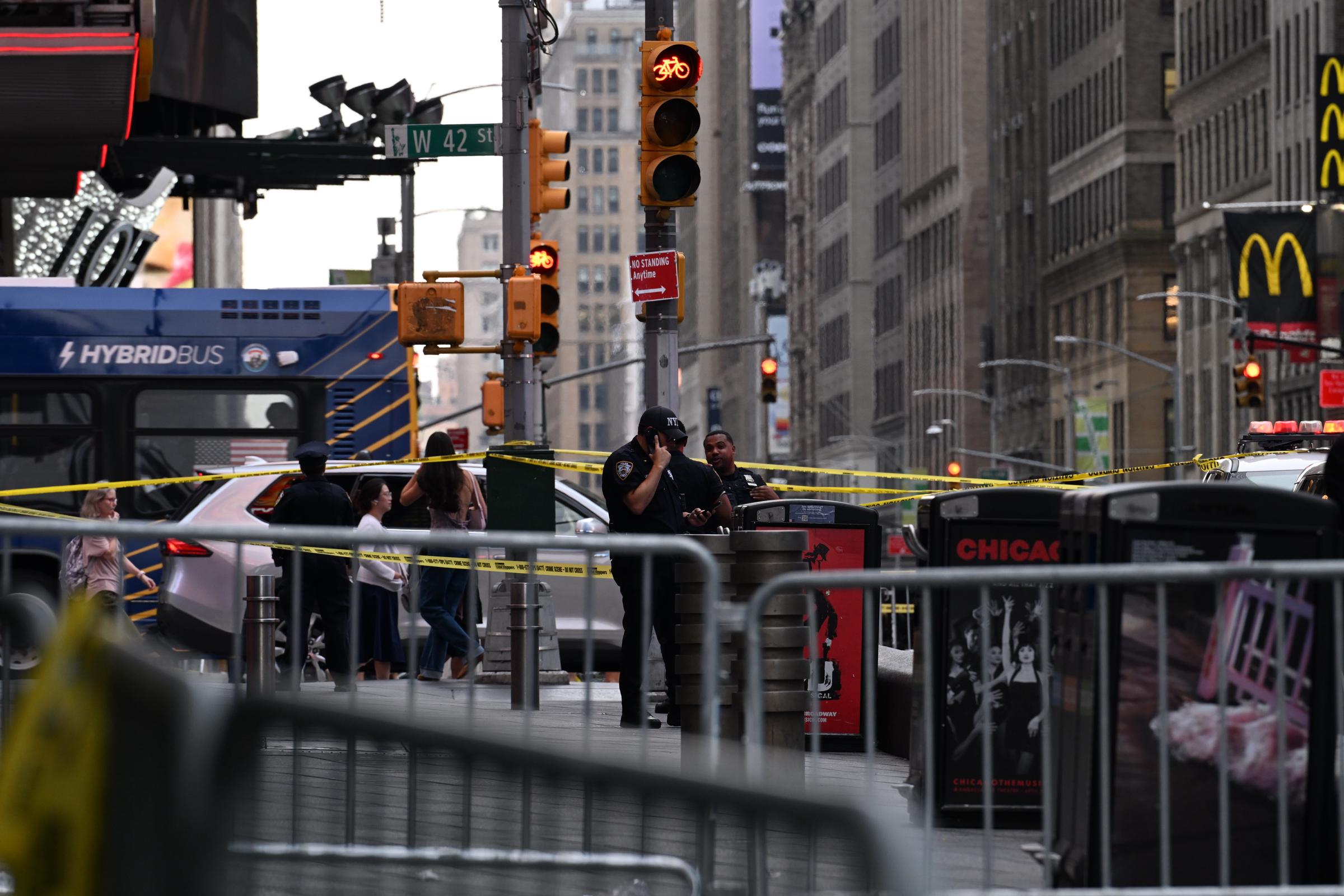 Police secured the area near West 42nd Street and Seventh Avenue as investigators responded to the two stabbings. One vi