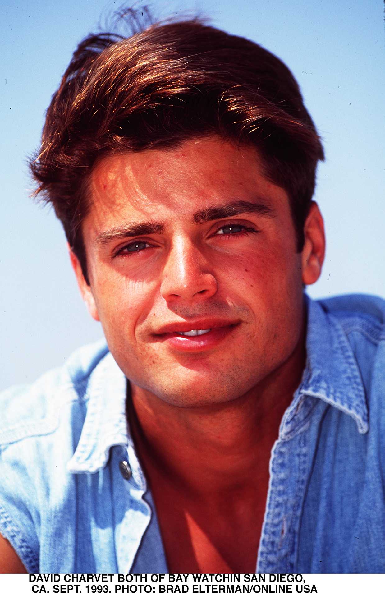 Taking a break from filming "Baywatch" in San Diego on September 1, 1993, David Charvet posed for a sunlit clo