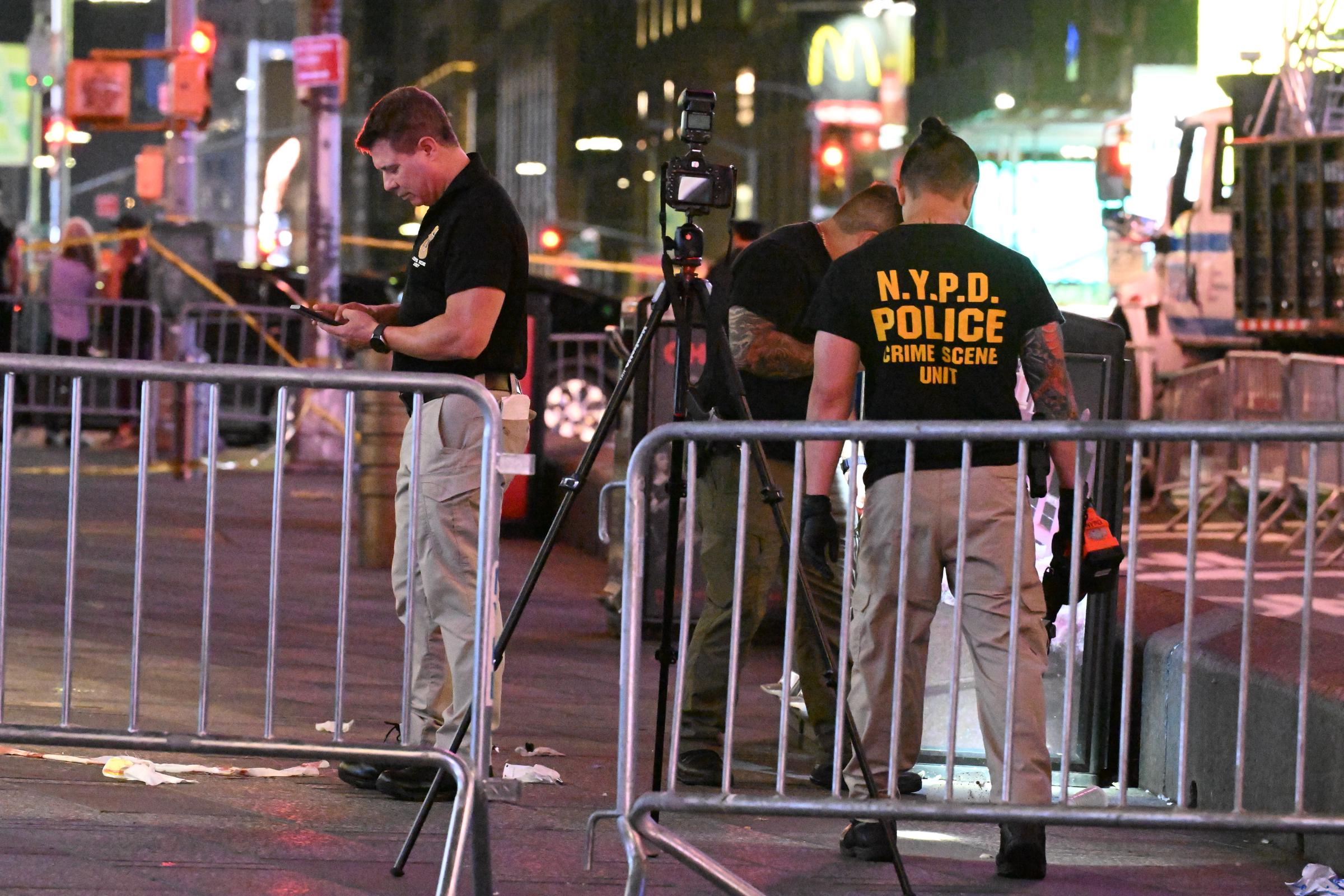 NYPD crime scene investigators remained at the scene after Pamela Cisneros was shot by police and Piacenti was fatally s