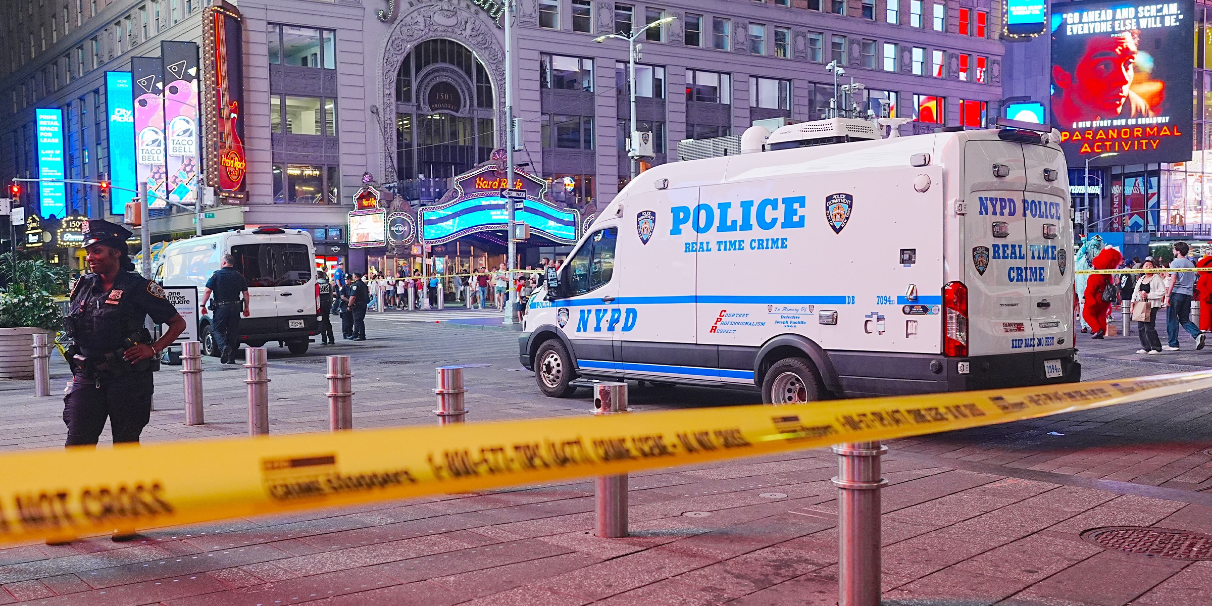 NYPD officers investigate a stabbing scene in Times Square | Source: Getty Images